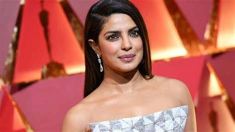 Priyanka Chopra heats up the internet in a red hot swimsuit ...